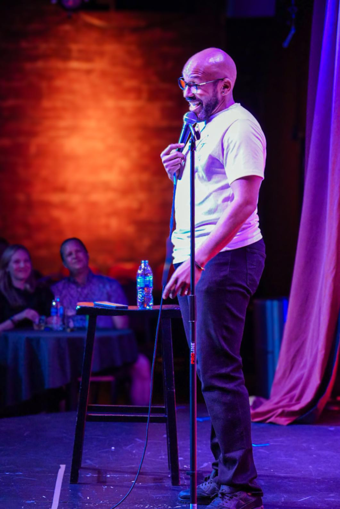 Plug Chapman performing stand-up comedy