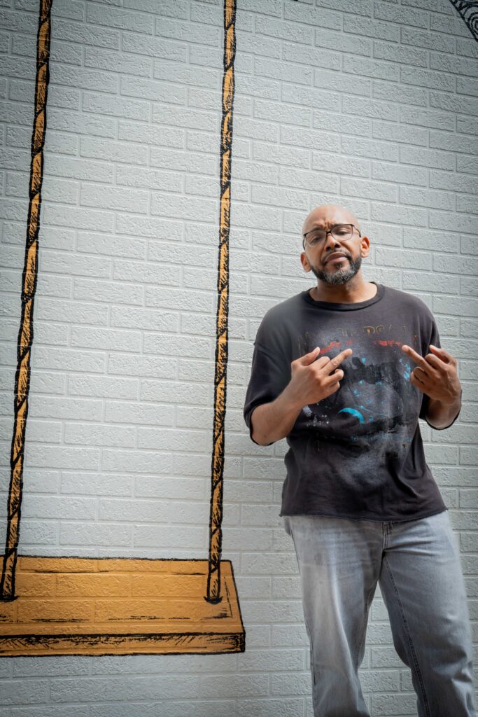 Plug Chapman performing stand-up comedy